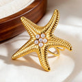 Bague coquillage étoile de mer dorée