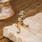 Anillo con concha y caballito de mar