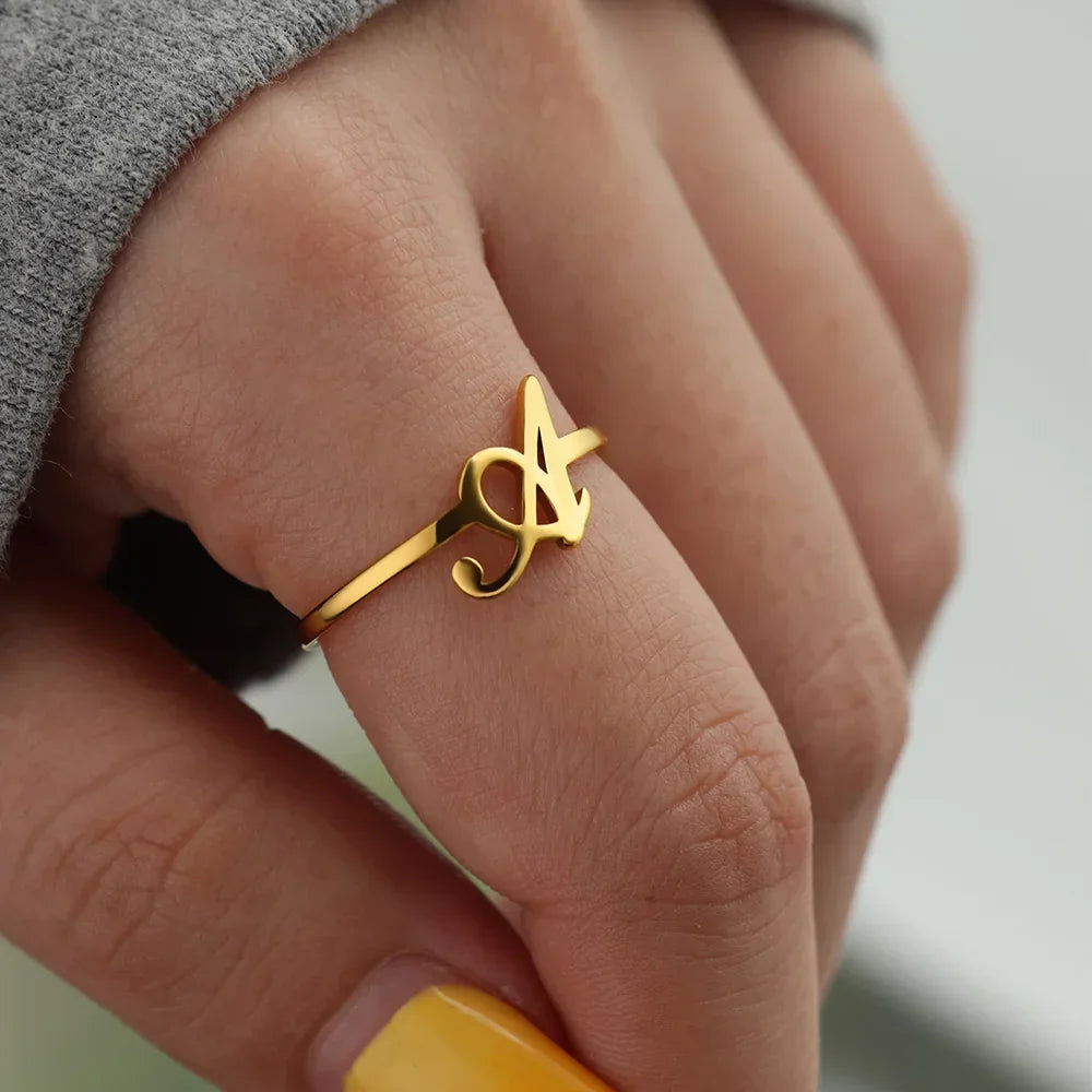 Slim ring decorated with an initial letter