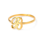 Slim ring decorated with an initial letter