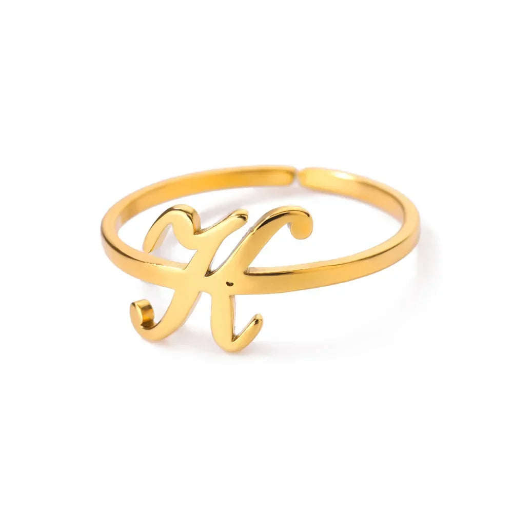 Slim ring decorated with an initial letter