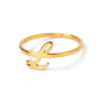 Slim ring decorated with an initial letter