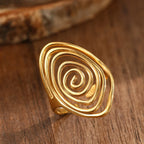 Bague large en forme de spirale texturée or