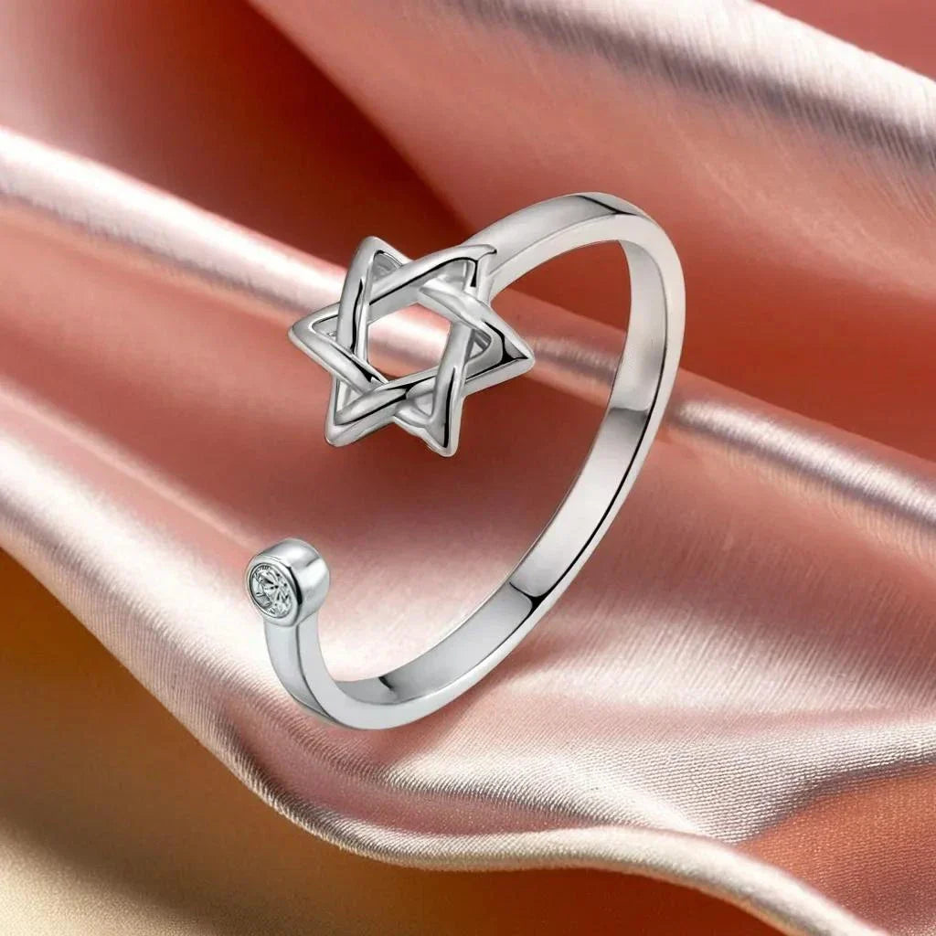 Open ring for women with the Star of David, a Jewish symbol 