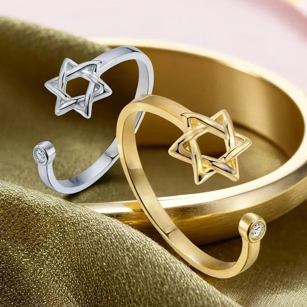 Open ring for women with the Star of David, a Jewish symbol 