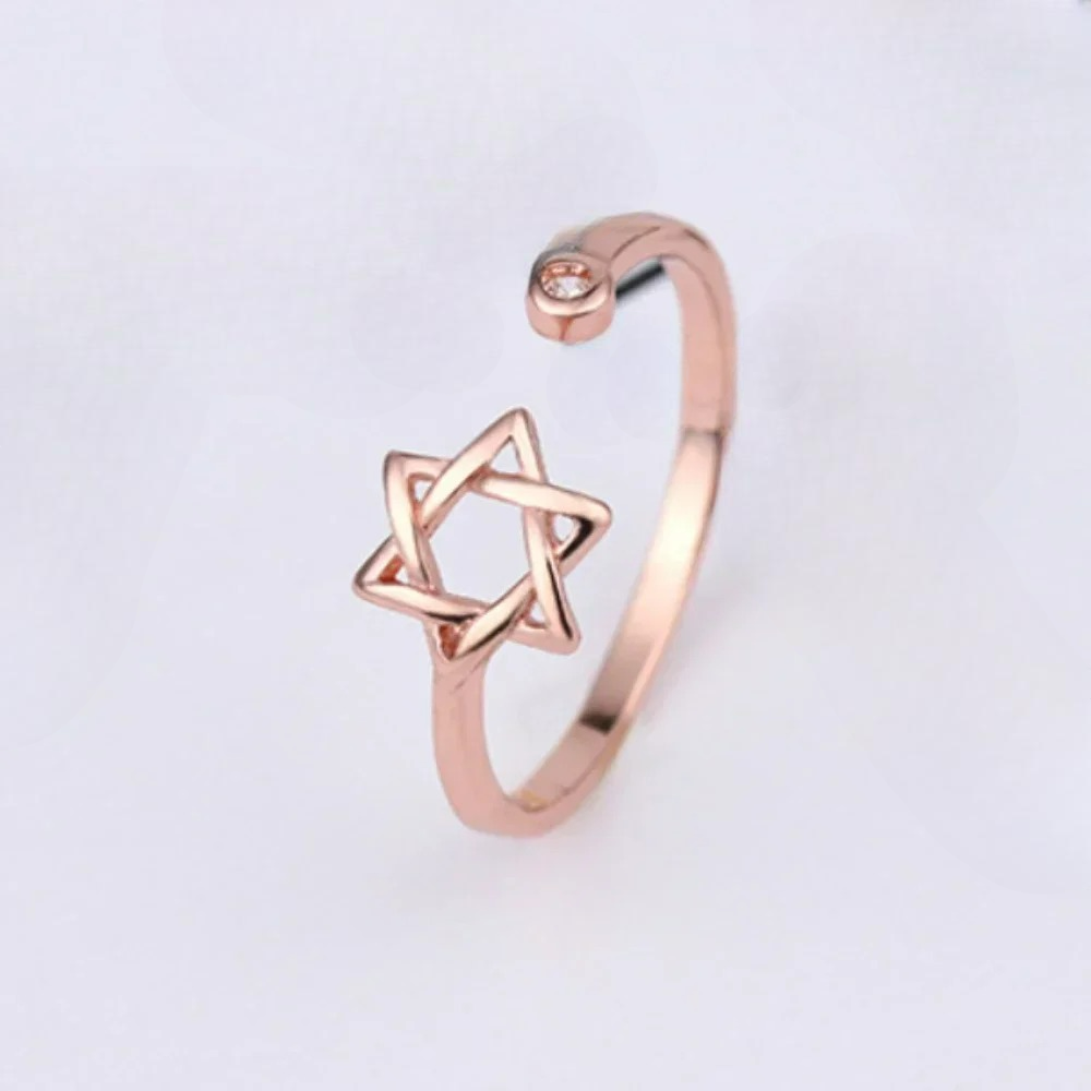 Open ring for women with the Star of David, a Jewish symbol 