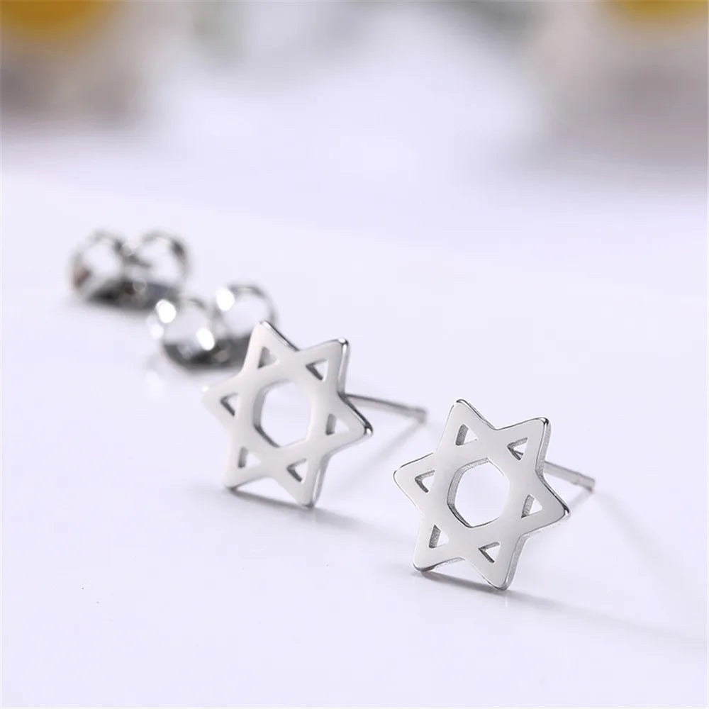 Boucles d'oreilles avec l'étoile de David symbolique juive argent