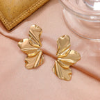 Pendientes de Perno Media Flor oro