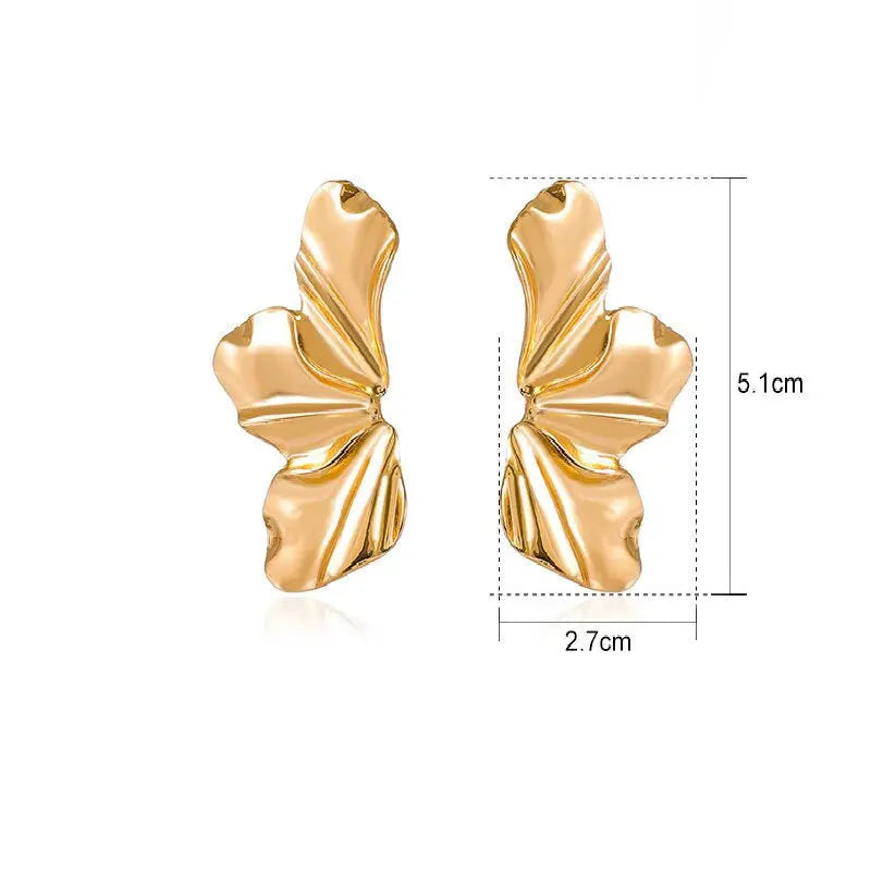 Pendientes de Perno Media Flor oro