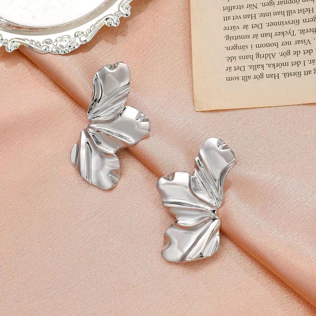 Pendientes de Perno Media Flor plata