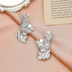 Pendientes de Perno Media Flor plata