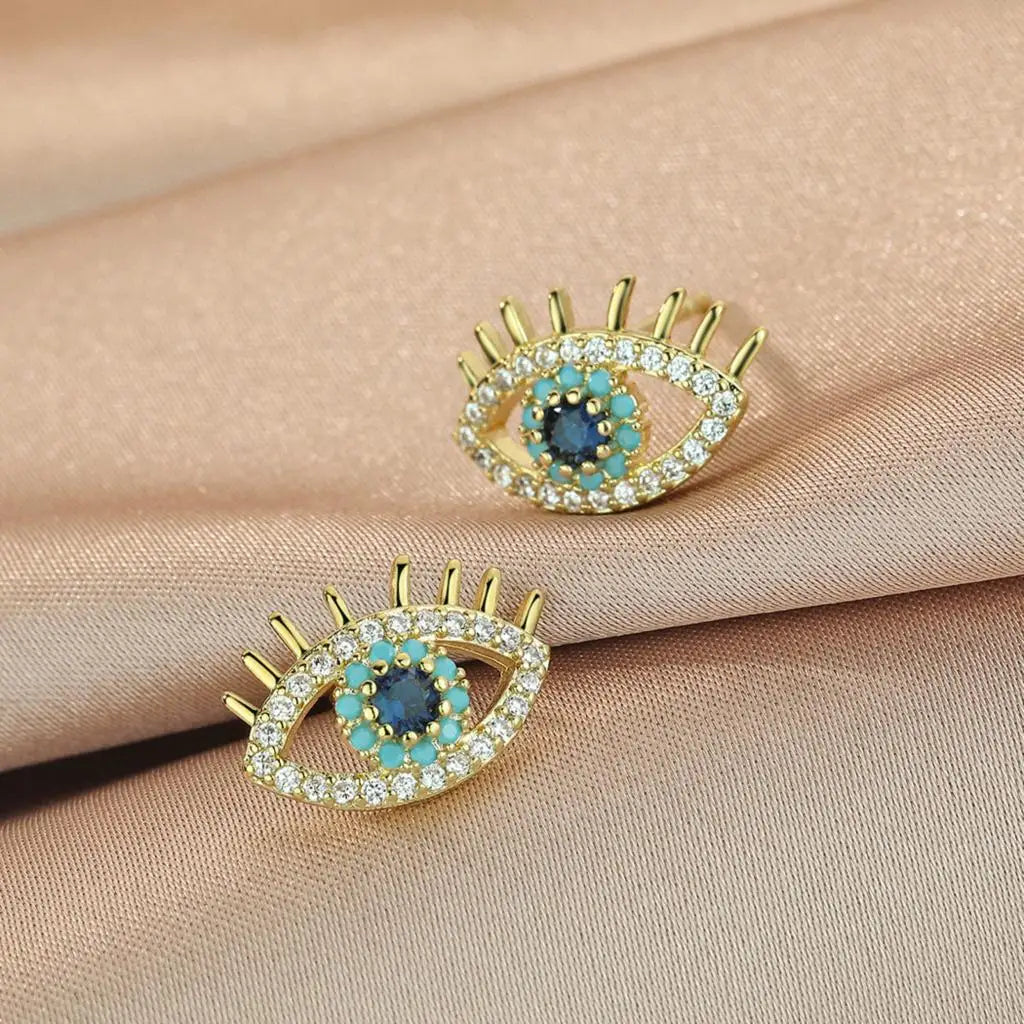 Boucles d'Oreilles Clou Oeil Bleu et Strass