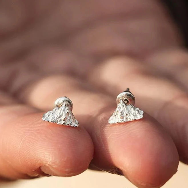 Silver Mountain Stud Earrings


Material: steel


Colors: silver


Size: 1 cm in diameter (see image)


Guaranteed hypoallergenic, suitable for men, women, boys, or girls


Highly crafted product