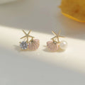 Pendientes de concha asimétricos 