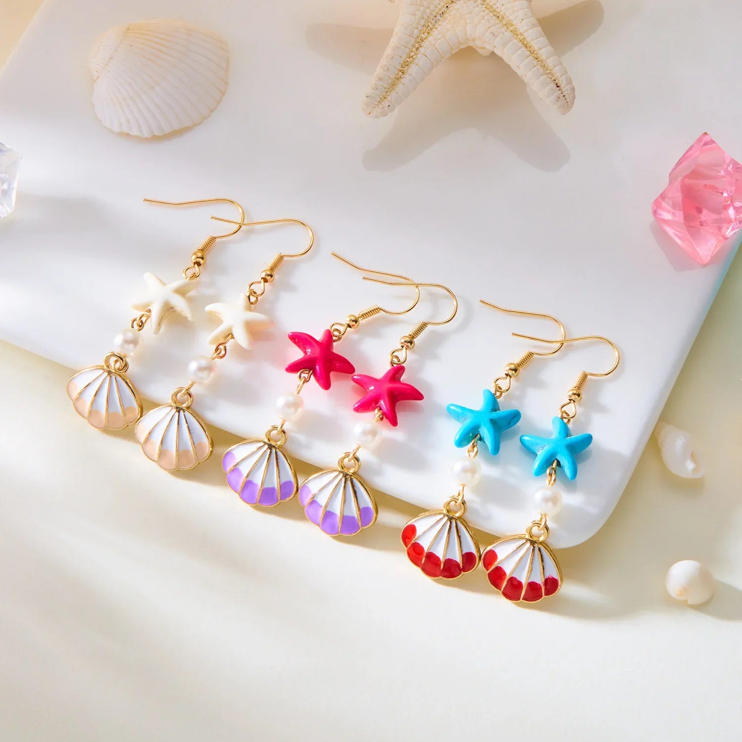 Boucles d'oreilles coquillage pendantes colorées 