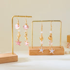 Boucles d'oreilles coquillage pendantes colorées 