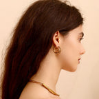 Boucles d'oreilles créoles avec motif spirale or