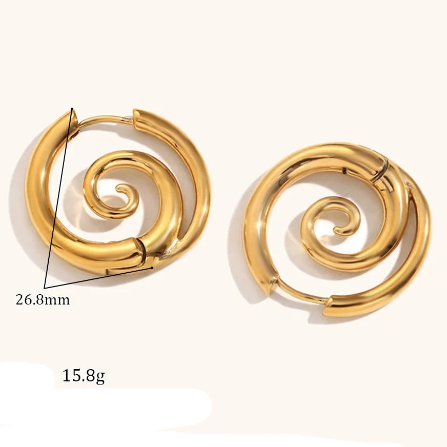 Boucles d'oreilles créoles avec motif spirale
