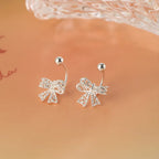 Boucles d'oreilles femme noeud papillon