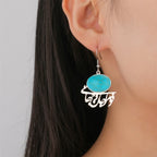 Oriental earrings with Arabic calligraphy and turquoise stone