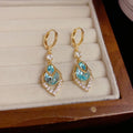 Boucles d'oreilles pendantes bleu ciel