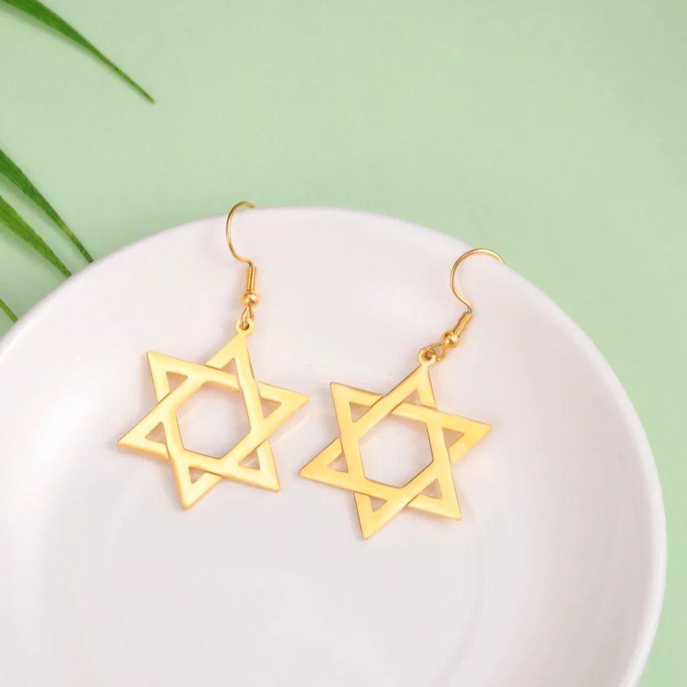 Boucles d'oreilles pendantes hexagonales avec le symbole juif de l'étoile de David or