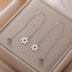 Boucles d'oreilles pendantes longues avec l'étoile de David symbole juif argent
