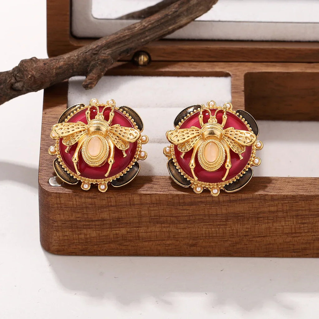 Pendientes redondos con abeja 