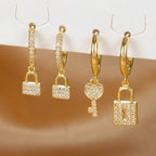 Boucles d'oreilles créoles clef et cadenas avec strass