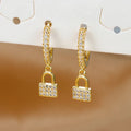 Round key and lock hoop earrings with rhinestones
