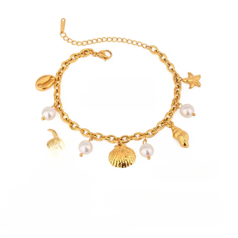 Pulsera con Conchas y Perlas Blancas