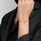 Bracelet avec croix et pierre de naissance
