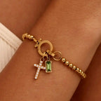 Bracelet with cross and birthstone