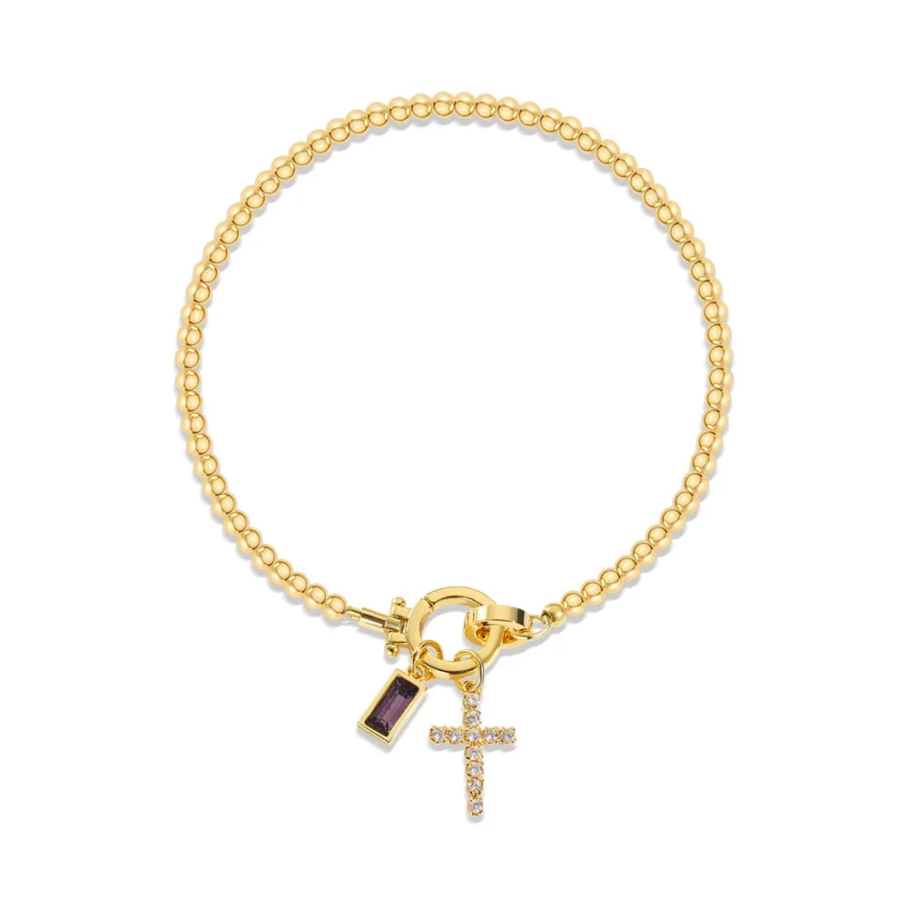 Bracelet avec croix et pierre de naissance