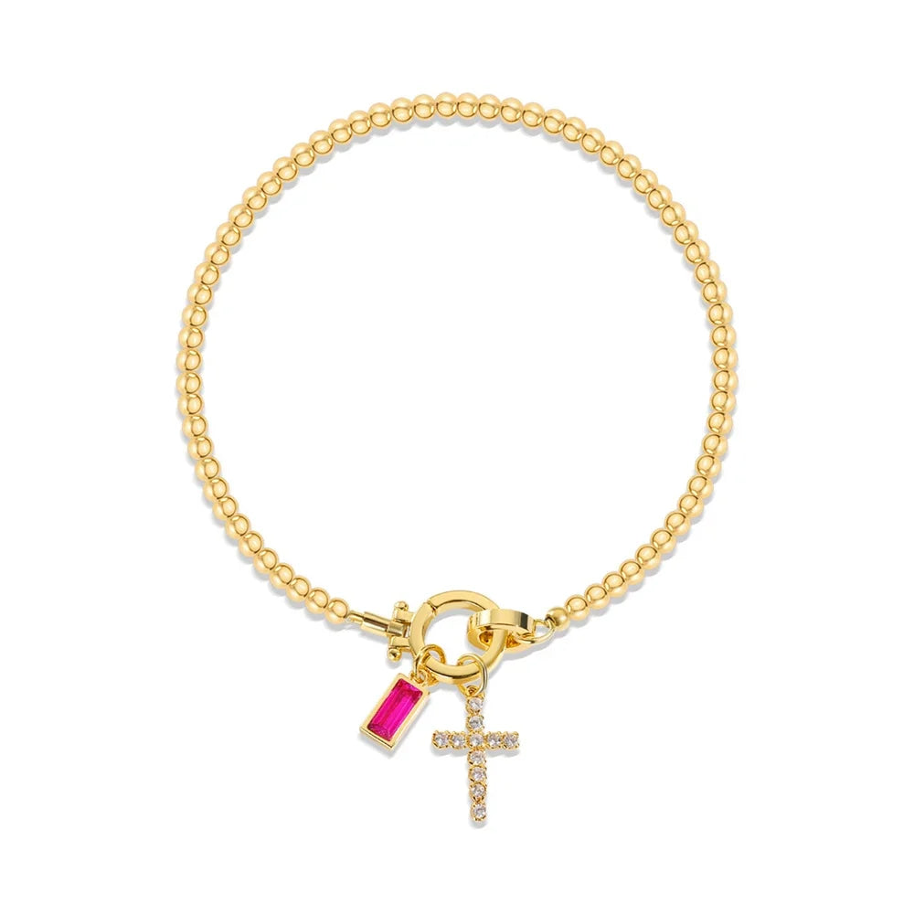 Bracelet avec croix et pierre de naissance