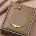 Gold Feather Charm Bracelet