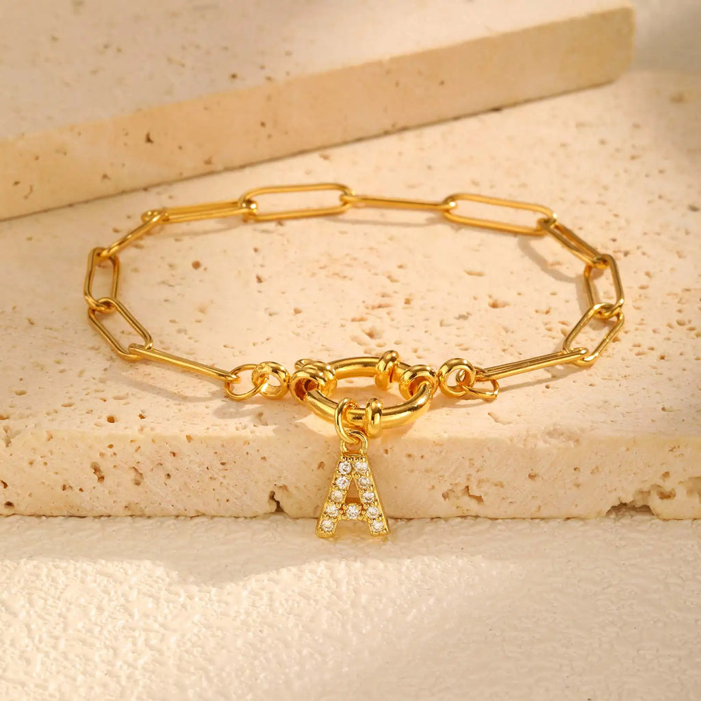 Pulsera dorada con inicial - letra 