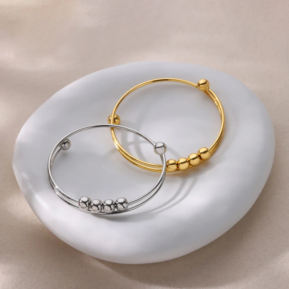 Pulsera con Perlas Giratorias Antiestrés para Hombre o Mujer plata