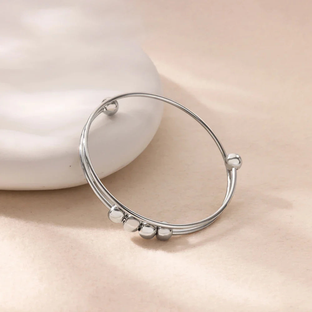 Pulsera con Perlas Giratorias Antiestrés para Hombre o Mujer plata