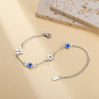 Bracelet avec symboles de protection oeil bleu, Chai et l'étoile de David argent