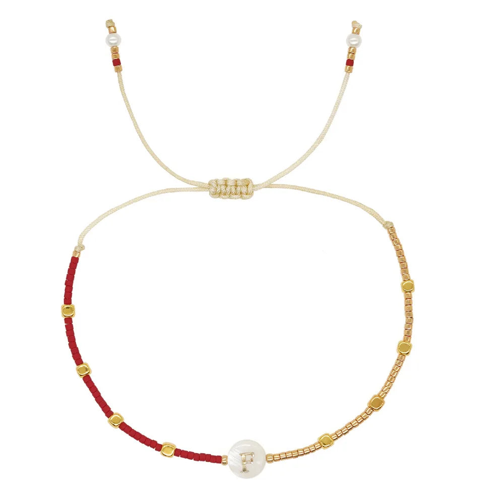 Two-tone initial letter bracelet