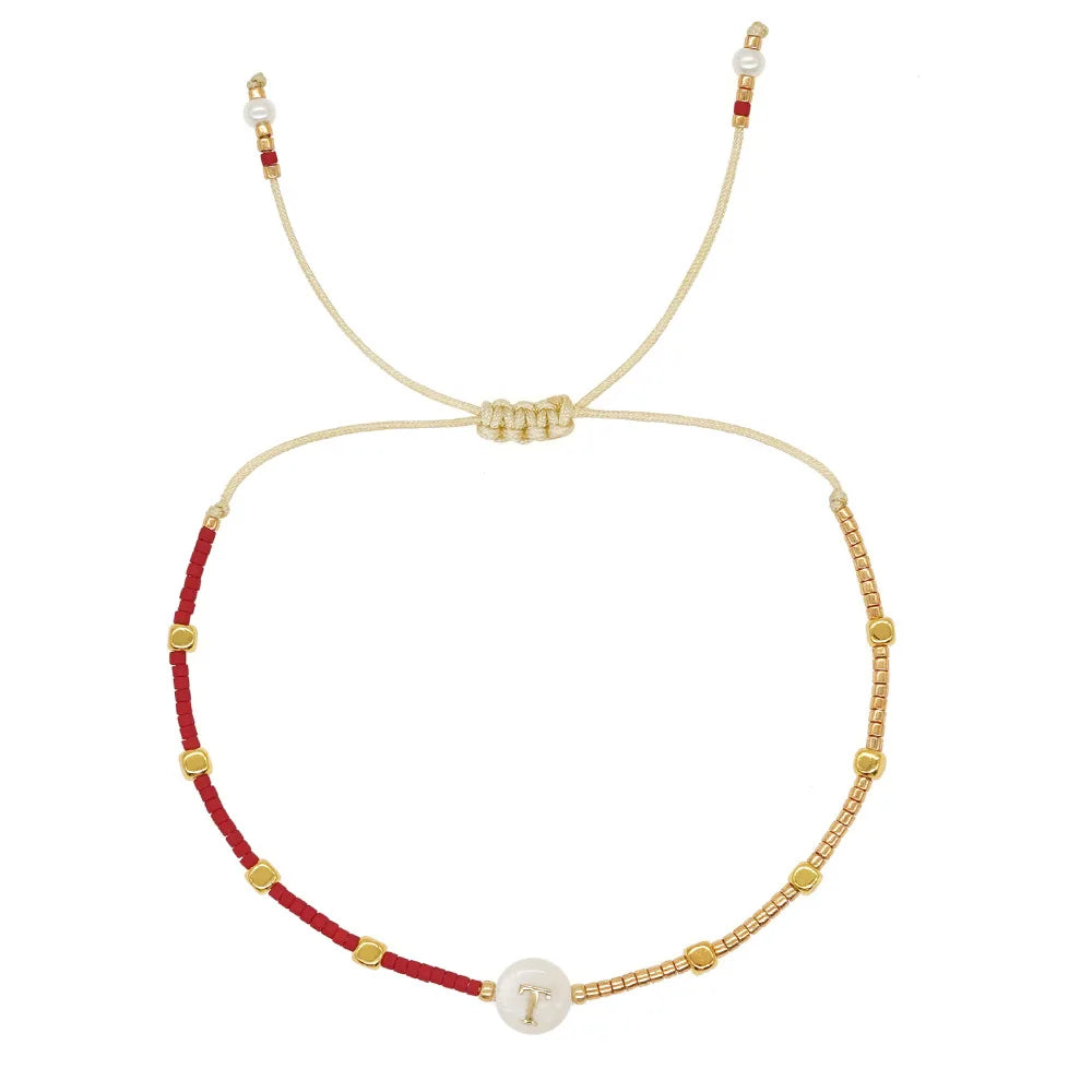 Bracelet bicolore initiale t