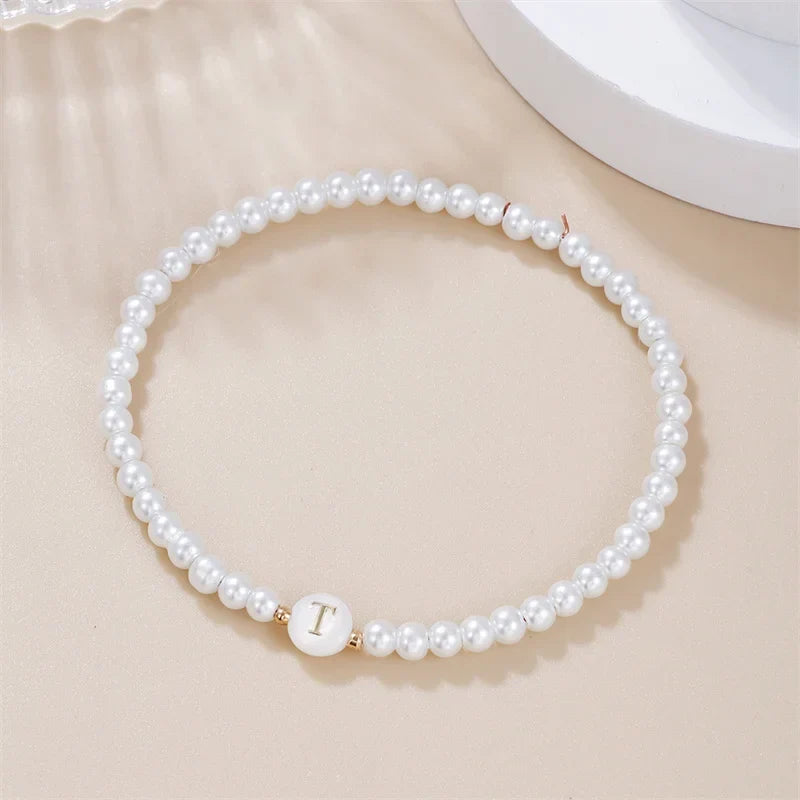 Bracelet blanc initiale t