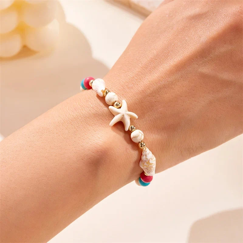 Bracelet cordon avec coquillage et étoile de mer rouge étoile