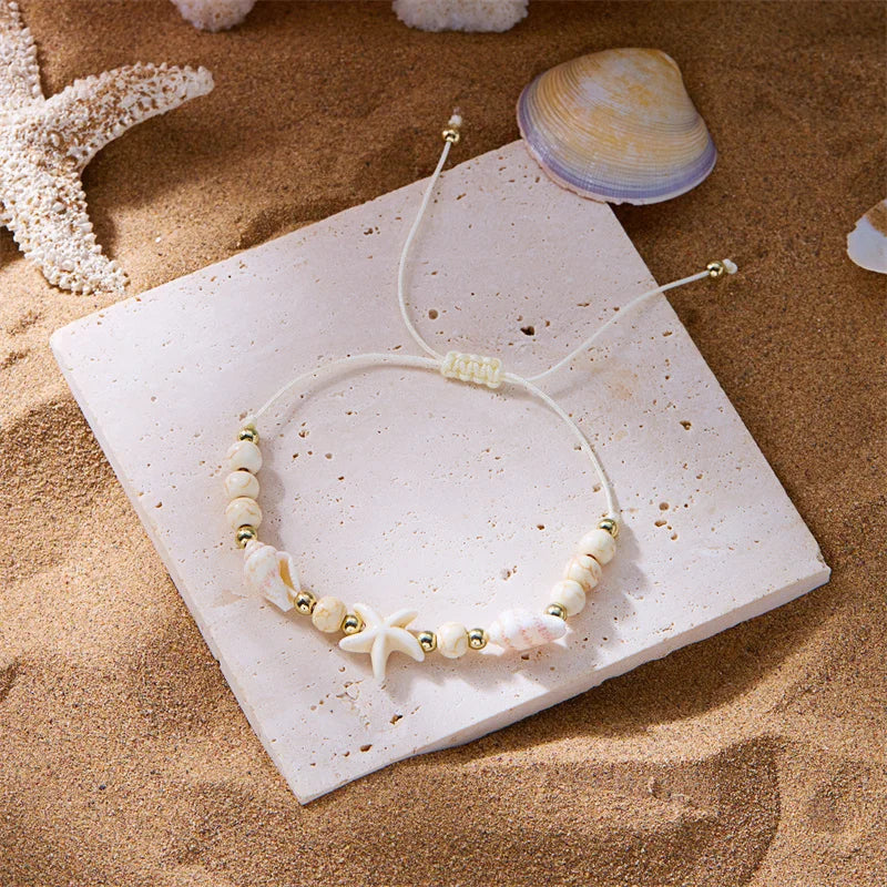 Pulsera de cordón con concha y estrella de mar 