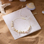 Pulsera de cordón con concha y estrella de mar 