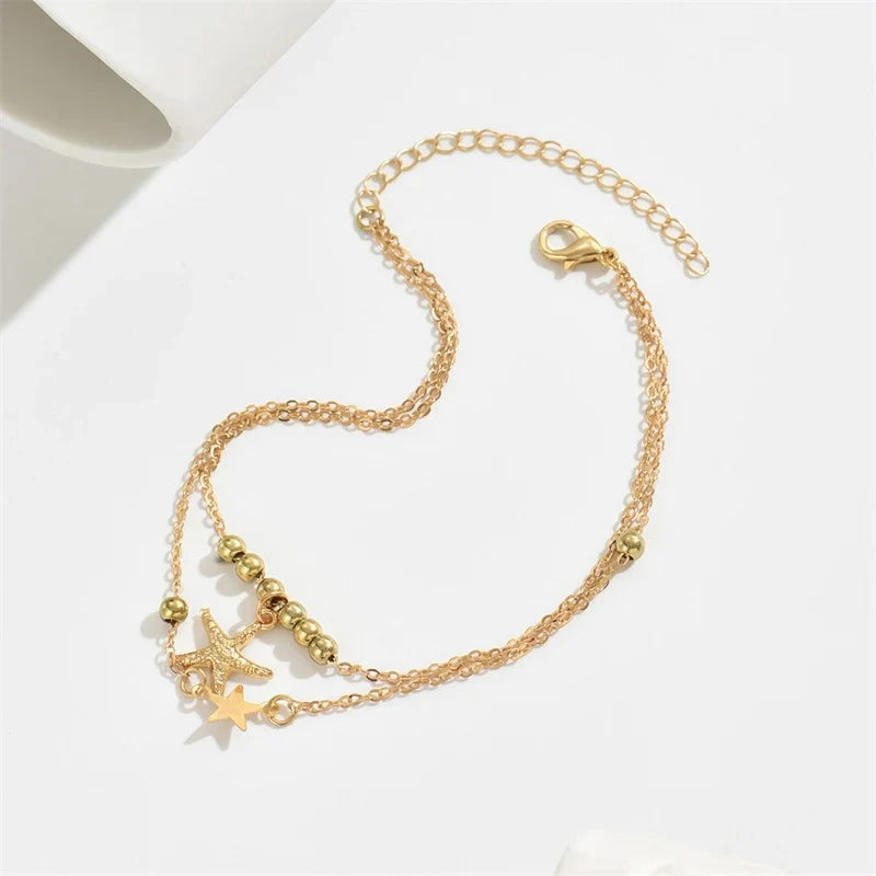 Bracelet de cheville étoile de mer dorée pour femme
