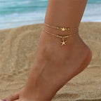 Tobillera estrella de mar dorada para mujer