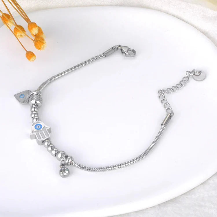 Pulsera de Protección con Mano de Fátima y Ojo Azul plata
