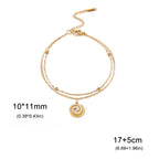 Bracelet doré avec petite breloque spirale